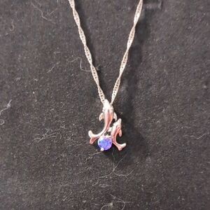 Elegant Silver Pendant Necklace with Purple Gemstone
